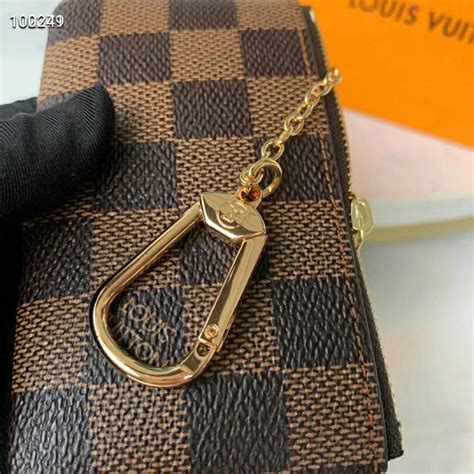 louis vuitton monogram canvas key pouch fake|authentic louis vuitton keychain.